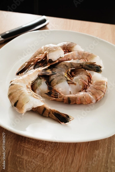 Obraz Rohe Riesengarnelen auf Teller