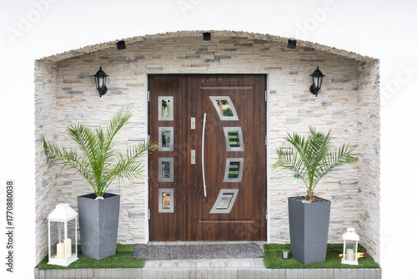 Obraz Designer entrance door to a country house. Modern design. luxurious exterior. Facade of a modern building with modern doors.
