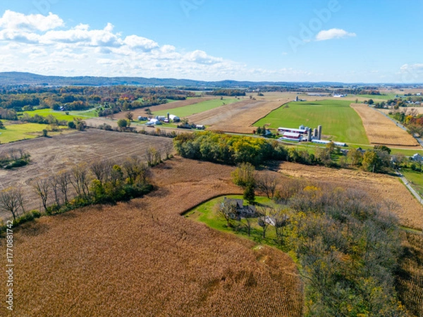 Fototapeta Aerial drone view of landscapes during the fall. Farm fields. 