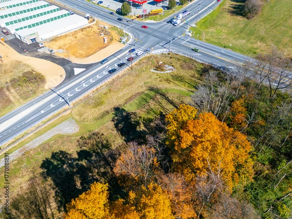 Fototapeta Aerial drone view of landscapes during the fall. Farm fields. 