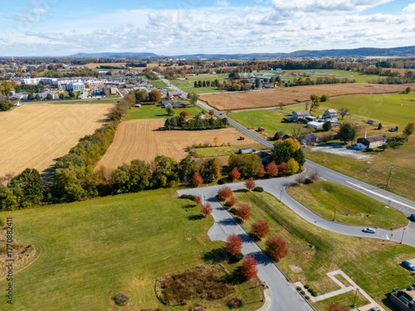 Fototapeta Aerial drone view of landscapes during the fall. Farm fields. 