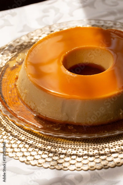 Fototapeta Condensed Milk Pudding, a smooth and creamy dessert made with condensed milk, eggs, and caramel, baked until golden and served chilled. 