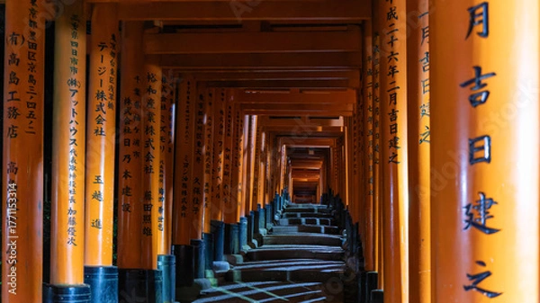 Fototapeta The beautiful Fushimi Inari Taisha temple and red torii in Kyoto, Japan on september 29th 2025