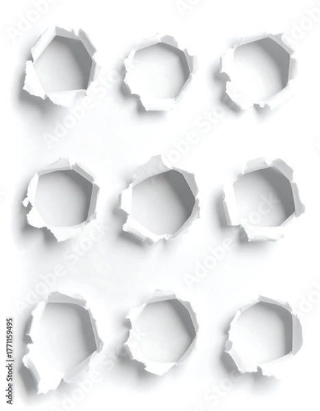 Obraz Nine paper torn holes, casting subtle shadows on a white surface