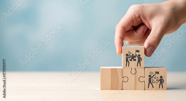 Fototapeta Businessman's hand placing the final puzzle piece to symbolize conflict resolution and agreement