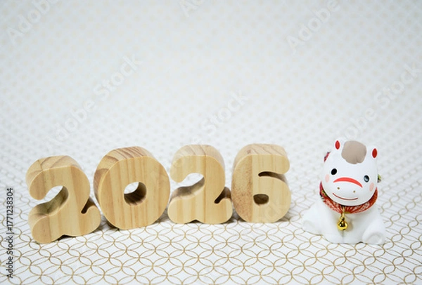 Obraz 可愛い馬の置物と七宝柄の背景の年賀状素材