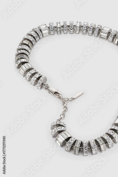 Obraz Elegant silver necklace with crystal accents on plain background for fashion