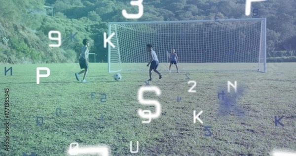 Fototapeta Running three boys dribbling soccer ball toward goal on pitch in uniform, floating digital overlays