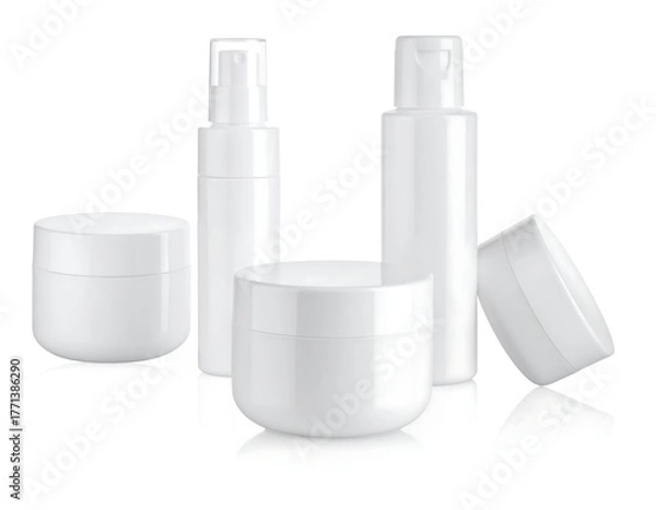 Fototapeta Group of white cosmetic containers on a white, reflective surface