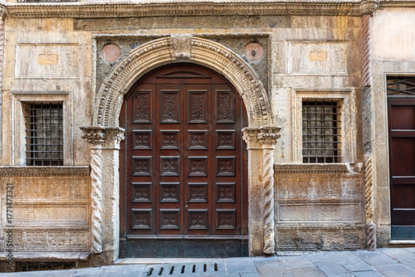 Fototapeta Facade of Casa Pigafetta showcasing detailed architecture in Vicenza, Italy on a sunny day