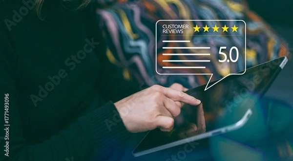 Fototapeta Positive customer feedback. Woman reviews 5-star rating on tablet. Girl write a good online review