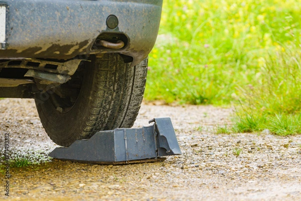 Fototapeta Camper broken leveling block in use.
