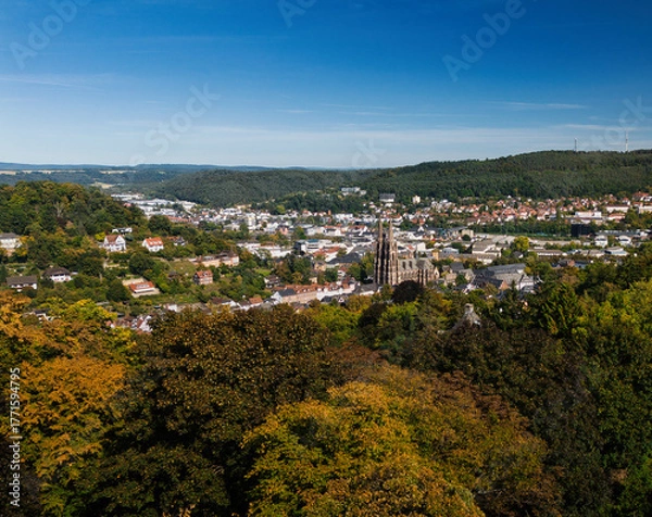 Obraz Aerial View of Town with Prominent Church and Lush Greenery