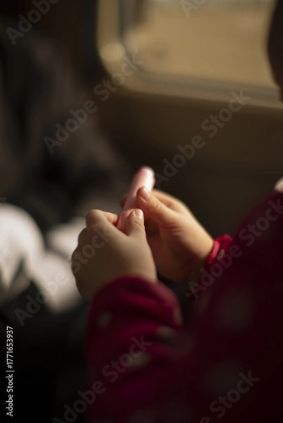 Fototapeta Small movements transform boredom into wonder, Boredom in travel evolves into fascination with tiny actions