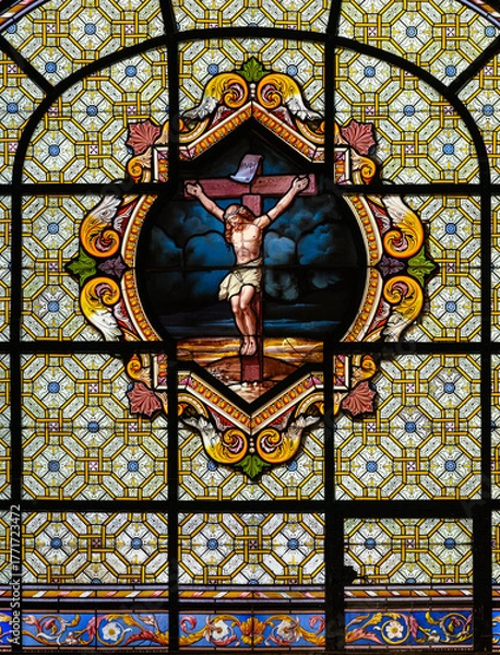 Obraz The Crucifixion of the Lord. Stained-glass window in Église Saint-Sulpice (The Church of Saint-Sulpice) in Paris.