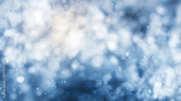 Fototapeta precipitation. Softly falling snowflakes in a winter scene with a cool blue atmospheric glow. travel magazines, destination branding, designed for outdoor magazines and nature guides.