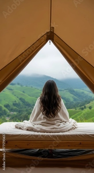 Fototapeta Person Resting in a Tent with a View of Rolling Hills. Serene Camping Scene with a Landscape Vista. Symmetrical Composition of a Tent Interior and Nature.