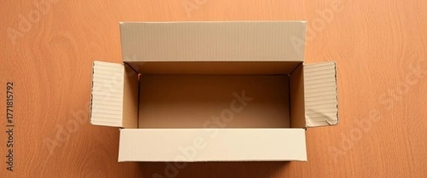 Obraz Empty brown cardboard box, open top, textured surface, shipment, product