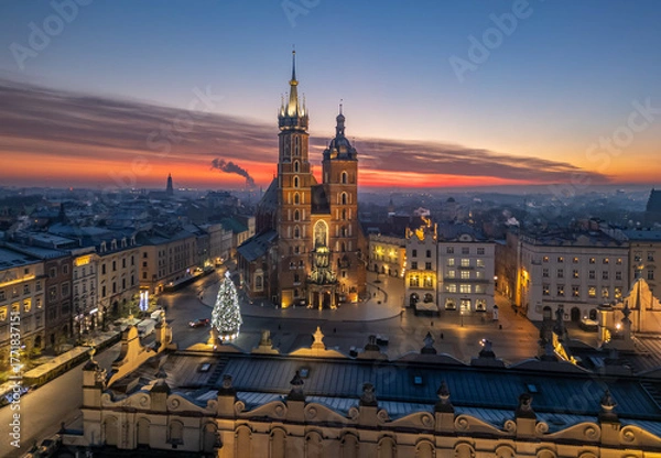 Fototapeta St Mary's church and Christmas tree on the Main Square during colorful sunrise, Krakow, Poland