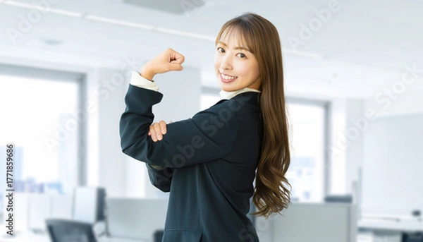 Fototapeta ガッツポーズをする女性・ビジネスウーマン