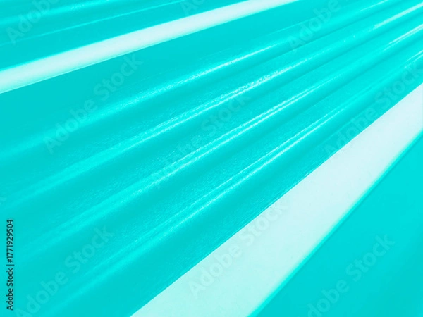 Fototapeta Follow aqua blue tracks & lines moving diagonally with ridges & texture indicating movement, speed & future.. Abstract clean forward lines indicate upward advance.