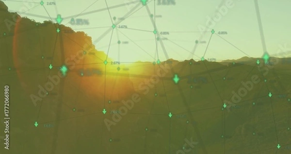 Obraz Displaying network graph overlaying valley at sunset, with green nodes and downward arrows