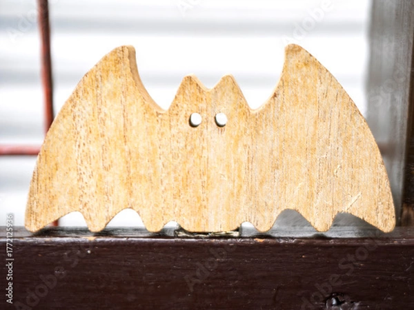 Fototapeta 木の温もりのこうもり飾り