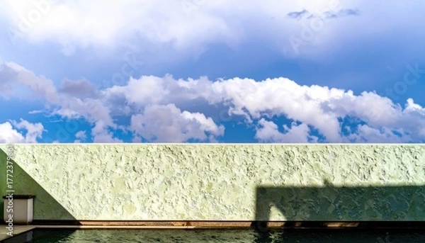 Obraz Light Green Wall and Cloudy Blue Sky