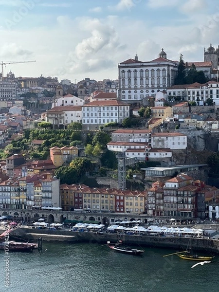 Obraz  Aerial view of Porto’s colorful buildings along the Douro River with historic architecture