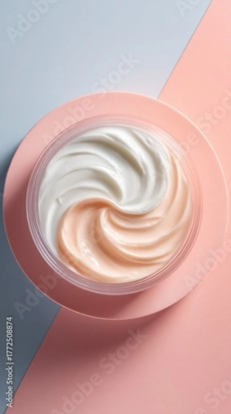 Fototapeta Luxurious skincare cream swirling in soft white and peach tones, showcasing smooth texture and elegant cosmetic design against pastel geometric background