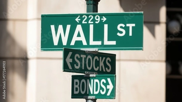 Obraz Wall Street Sign: A close-up view of the iconic Wall Street sign, with arrows pointing towards stocks and bonds. This image symbolizes the heart of finance and the bustling world of trading.