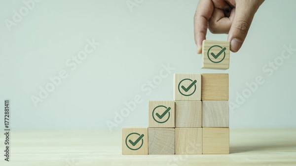 Obraz Wooden blocks with green checkmarks arranged in ascending steps progress