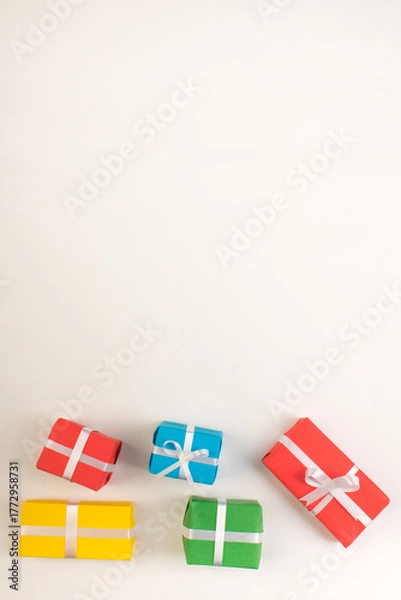 Fototapeta Gift boxes and colorful present for christmas on isolated white background. Top view with copy space.