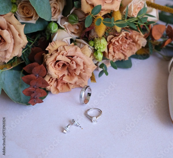 Obraz Rings, earrings, bouquet, bridal shoe
