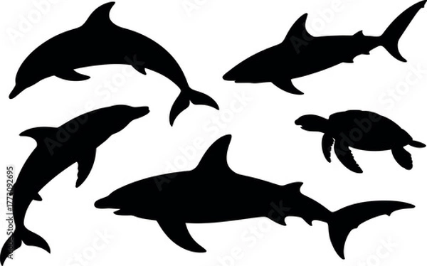 Fototapeta Silhouettes of marine life including dolphins, sharks, and a turtle.