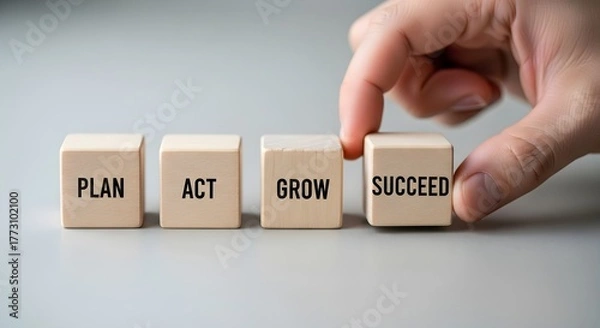 Fototapeta Hand arranging wooden cubes with words Plan Act Grow Succeed on light background, concept of business growth strategy and success planning