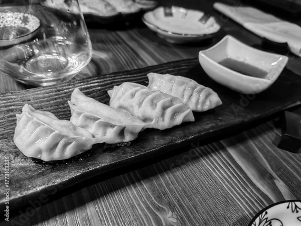 Fototapeta Typical food in a Japanese restaurant, an expression of the culinary art developed in Japan.