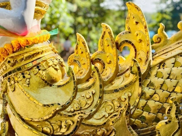 Fototapeta statue of a woman with a butterfly