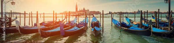 Fototapeta Gondolas in Venice with San Giorgio Maggiore church on background, Italy