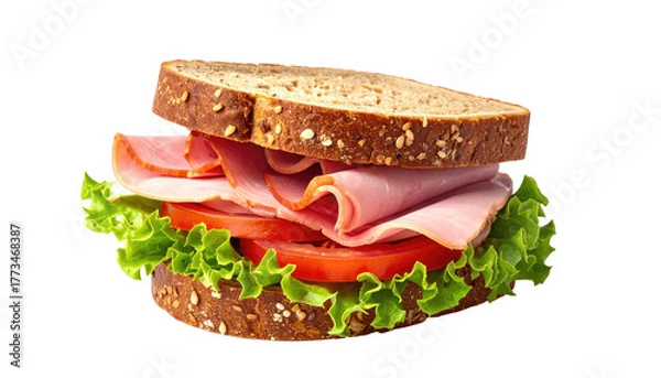Fototapeta Ham, lettuce, and tomato sandwich on seeded whole wheat bread
