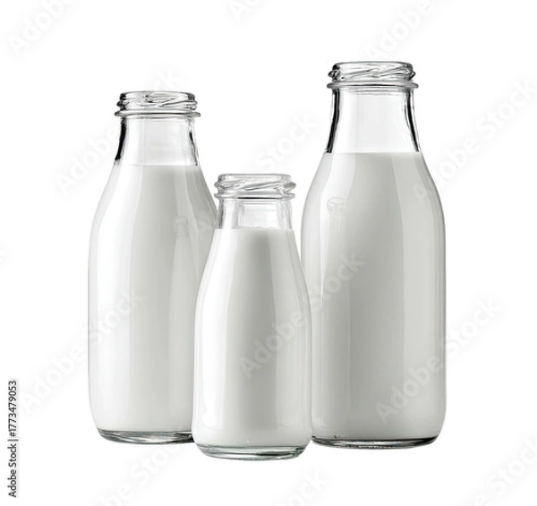 Fototapeta Three glass bottles of fresh milk, various sizes, on black