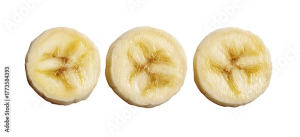 Fototapeta Three perfectly sliced banana rounds on black background