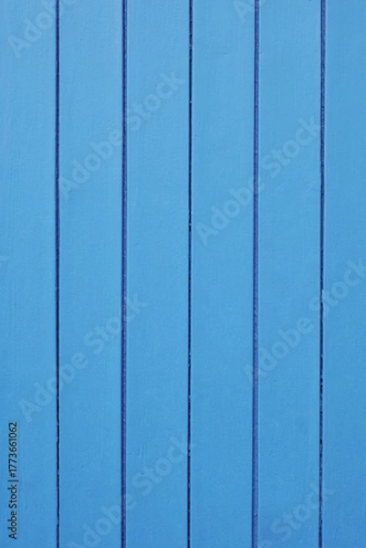 Fototapeta wooden door background with vertical boards and blue paint