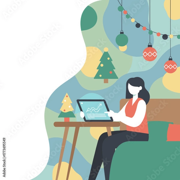 Obraz Freelancer working from home during holidays reviewing finance on tablet