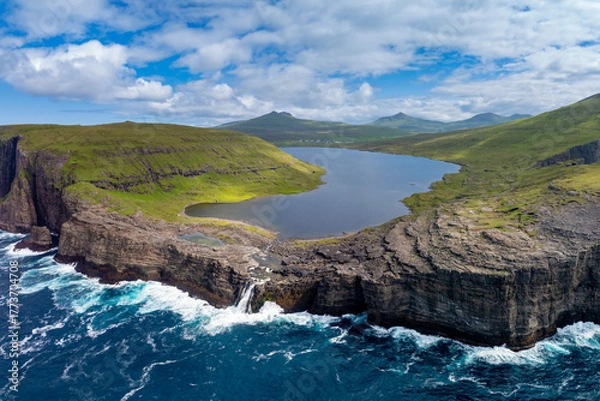 Fototapeta aerial view of Sorvagsvatn Lake and Bosdalafossur Waterfall on Vagar Island in the Faroe Islands