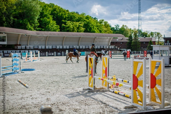 Obraz Show jumping arena with obstacles, barriers and poles, horse riding, equestrian sport and horses concept, competition field, background wallpaper 