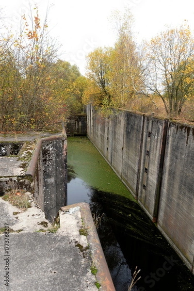 Obraz Gateway No. 4 of the Mazursky Canal near the village of Novo-Biyskoe, Kaliningrad region.An unfinished waterway in former East Prussia