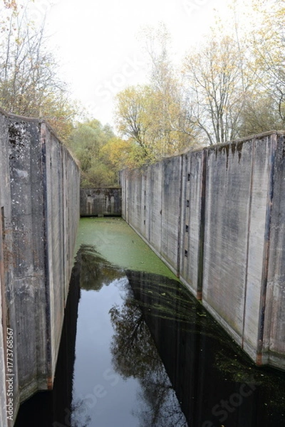 Obraz Gateway No. 4 of the Mazursky Canal near the village of Novo-Biyskoe, Kaliningrad region.An unfinished waterway in former East Prussia