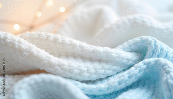 Obraz Soft knitted blanket with cozy lights, perfect for comfort and warmth