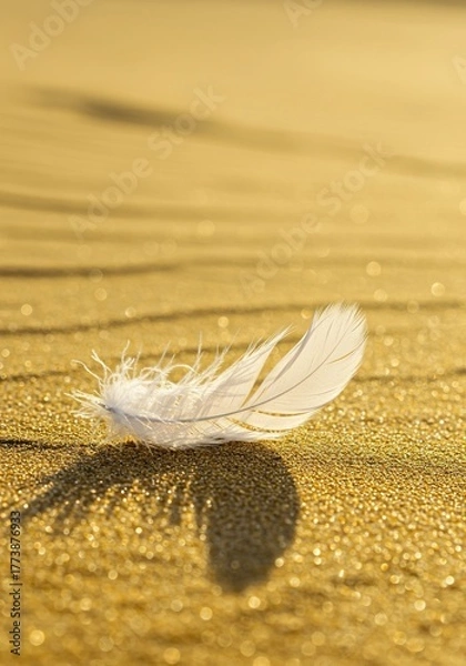 Fototapeta Glowing white feathers resting gently on golden shimmering warm sand under bright summer sunshine, symbolizing heavenly tranquility and peaceful vacation ,sacred ,dreamy ,abstract